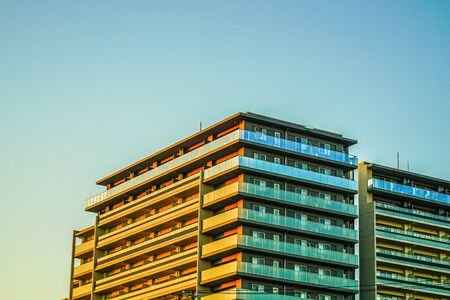 Luxury apartments and dusk skyの写真素材