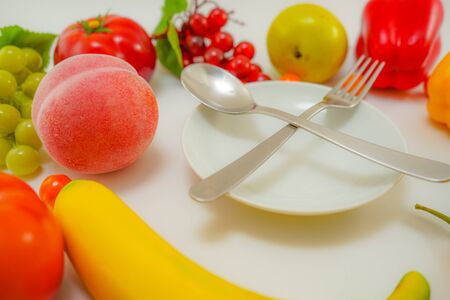 Vegetable and fruit and the dish was placed on the tableの写真素材