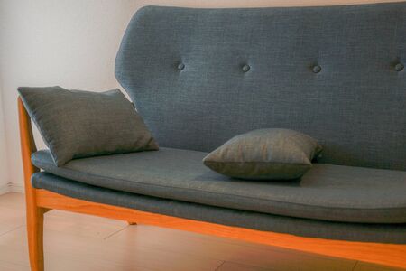 Stylish sofa that was illuminated by the lighting