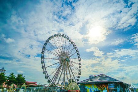Ferris wheel and blue sky of Thailand Bangkokの写真素材
