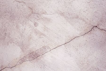 Cracked walls illuminated by the lightの写真素材