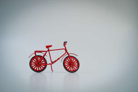 Miniature figures of red bicycleの写真素材