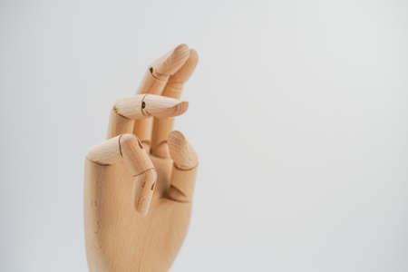 The hands of image for the wooden drawingの写真素材