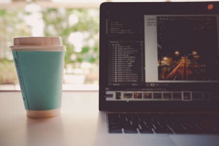 Hot Drink and Laptop Imageの写真素材