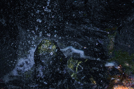 Water that can be played for the stone. Shooting Location: Kamakura City, Kanagawa Prefectureの写真素材