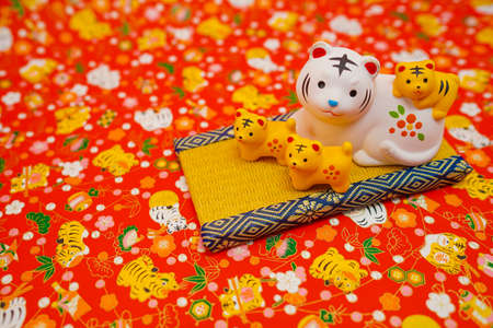 Tiger doll and background background (New Years card material). Shooting Location: Tokyo metropolitan areaの写真素材