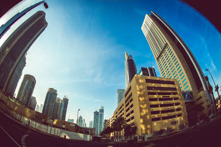 Dubais morning ray and high-rise buildings (United Arab Emirates). Shooting Location: Dubai