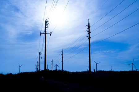 Rural landscape with wind power. Shooting Location: Akita