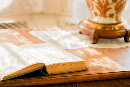 Book placed on the desk by the window. Shooting Location: Torontoの写真素材