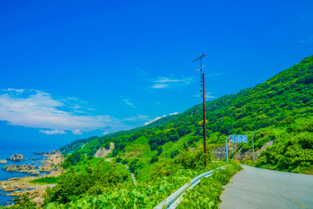 Bent coastal road. Shooting Location: Akitaの写真素材