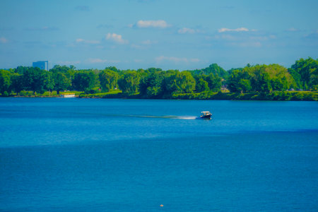 Boat sliding on the surface of the lake. Shooting Location: Washington DC