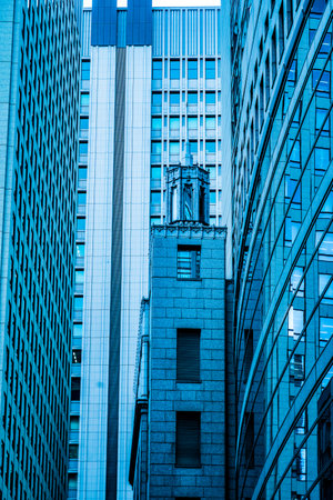 blue glass buildings. Shooting Location: Chiyoda ward, Tokyoの写真素材