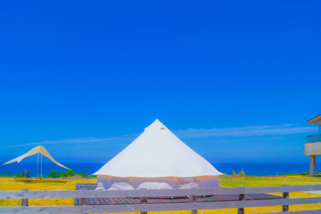 Campsite tent and sea. Shooting Location: Niigata Prefectureの写真素材