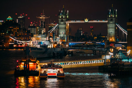 Night view of Tower Bridge and ships in London. Shooting Location: UK, Londonの写真素材