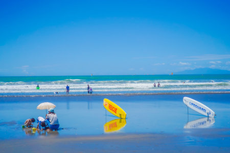 protection and family at the beach. Shooting Location: Kamakura City, Kanagawa Prefectureの写真素材