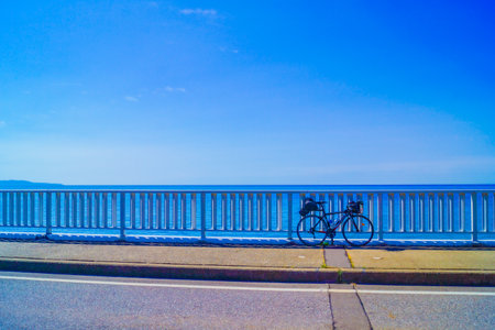 cycling by the sea. Shooting Location: Akita prefectureの写真素材