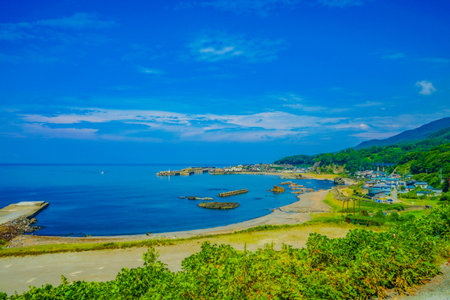 Summer scenery of fishing village and the Sea of ??Japan. Shooting Location: Yamagata Prefectureの写真素材