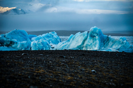 iceberg and black beach. Shooting Location: Iceland, Reykjavik