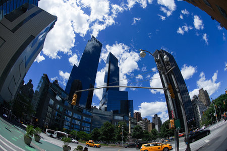 New York skyscrapers reflected in the blue sky. Shooting Location: new york, manhattan
