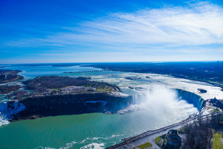 Waterfall and urban landscape.の写真素材
