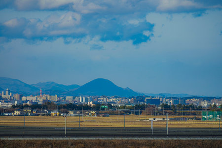 Sendai city skyscrapers and rural scenery. Shooting Location: Sendai City, Miyagi Prefectureの写真素材