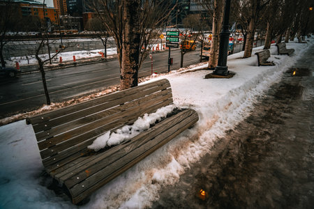 snow covered bench. Shooting Location: montreal, canadaの写真素材
