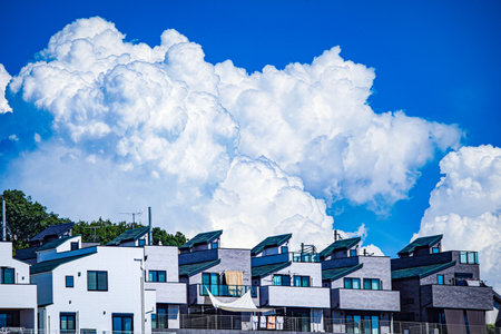 Clouds in the summer sky and residential area. Shooting Location: Kanagawa Ward, Yokohama Cityの写真素材