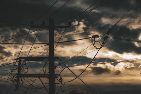 Residential area and electric lines at dusk. Shooting Location: Sendai City, Miyagi Prefectureの写真素材