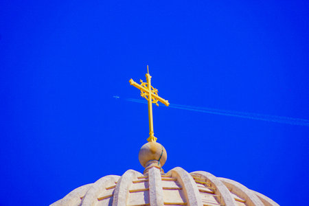 golden cross and airplane. Shooting Location: Marseille, France