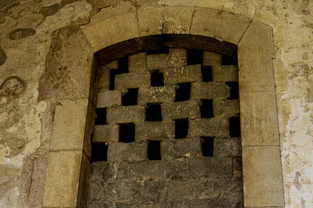 San Ferran castle lattice window. Shooting Location: Spain