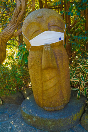 praying mask jizo. Shooting Location: Kamakura City, Kanagawa Prefectureの写真素材
