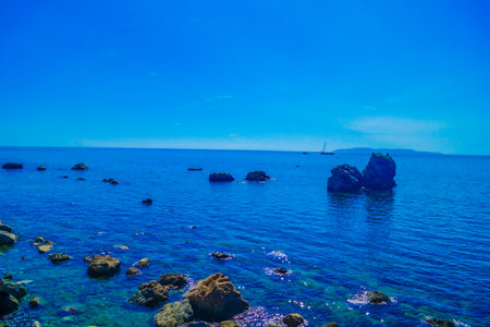 blue sky and rocky sea. Shooting Location: Yamagata Prefectureの写真素材