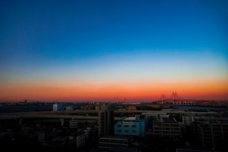 The bridge and the dyed sky. Shooting Location: Naka Ward, Yokohama Cityの写真素材