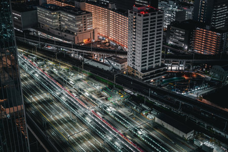 Buildings and railway network at night. Shooting Location: Minato Ward, Tokyoの写真素材