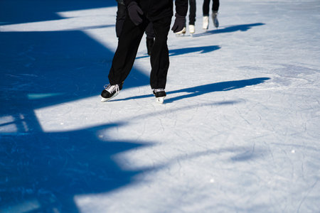 Skater crossing the shadow. Shooting Location: Montreal, Canada