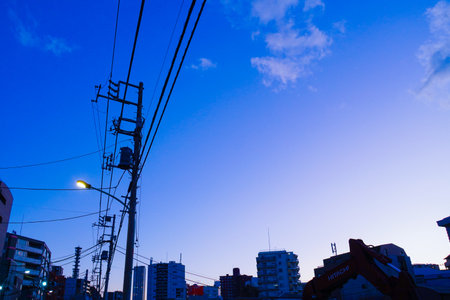 Dusk city and construction machinery. Shooting Location: Kohoku Ward, Yokohama Cityの写真素材