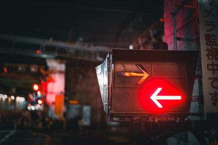 Railroad crossing arrow lights at night. Shooting Location: Minato Ward, Tokyoの写真素材