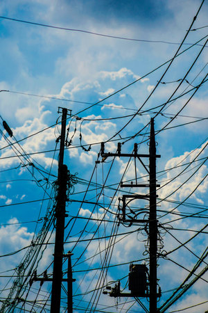 Electric pole stretching into the blue sky. Shooting Location: Kohoku Ward, Yokohama City