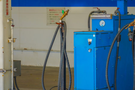 Blue fueling equipment and hoses. Shooting Location: Fukuoka Prefectureの写真素材