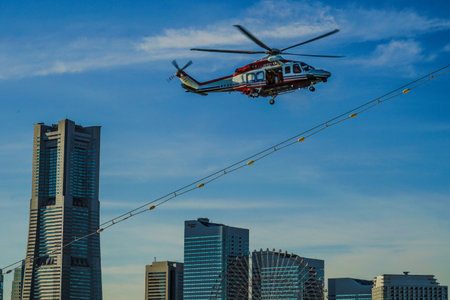 Firefighting helicopter flight at the New Years ceremony. Shooting Location: Naka Ward, Yokohama Cityの写真素材