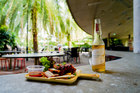 Bottled beer and appetizers in the shade. Shooting Location: Singapore