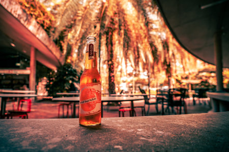 Sunset-colored bottled beer.の写真素材
