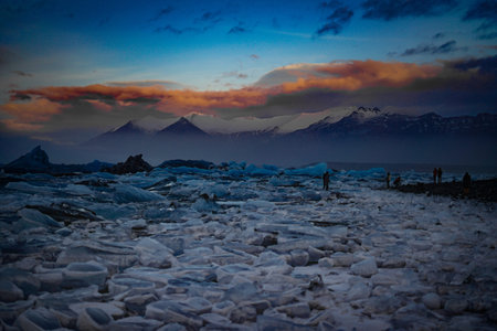 Sunset clouds and snowy mountains (VatnajÃ¶kull). Shooting Location: Iceland