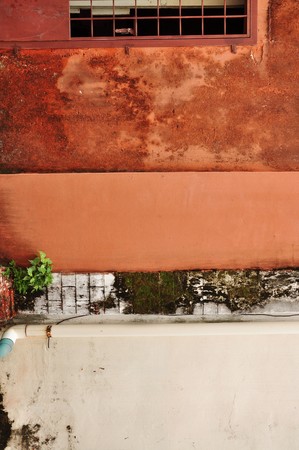 The rust wall with mossの写真素材