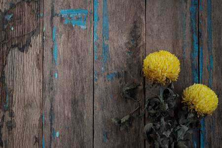 Bouquet of dried flowers on wood planks floor.の写真素材
