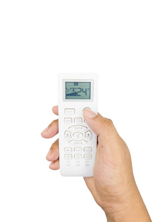 Hand holding remote control isolated on white backgroundの写真素材