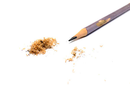 Pencil with sharpening shavings on white backgroundの写真素材