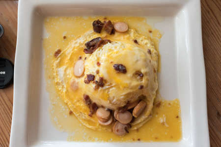 omelette with rice bacon Sausageの写真素材