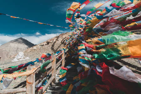 View of praying flags against mountainsの写真素材