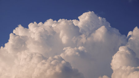 The sky is filled with soft white clouds.